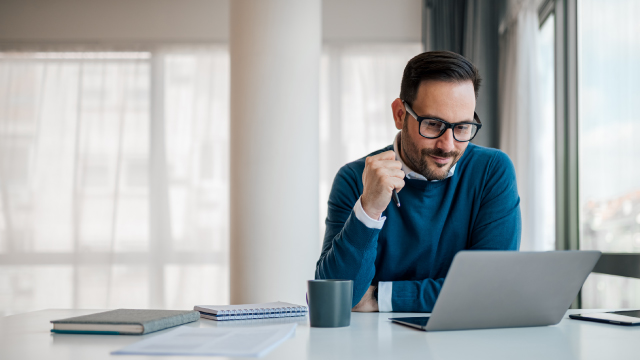 Business professional working at desk.